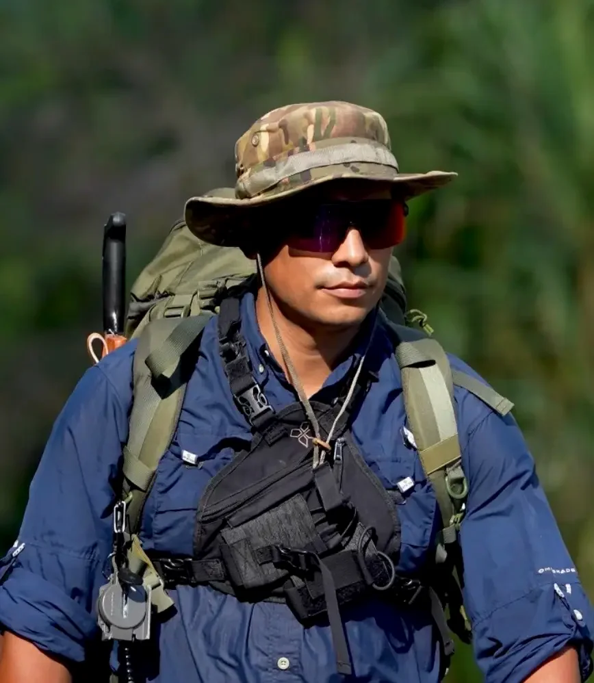 David Villanueva, founder of Sukia Travel, on expedition with full pack in the Osa Peninsula, Costa Rica